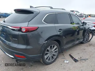 2021 Mazda CX-9 Signature with VIN JM3TCBEY3M0505266, listed as a IAAI auction lot 41835730 with 90,678 mi miles and . Bid and sale history available at DreamBid. Image 4.