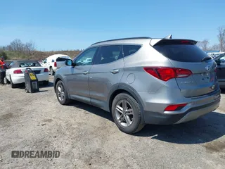 2017 Hyundai Santa Fe 2.4L z VIN 5NMZUDLB7HH015347, wystawiony jako IAAI lot #42035606 z przebiegiem 118 305 mil mil oraz . Historia ofert i sprzedaży dostępna na DreamBid. Obrazek 3.