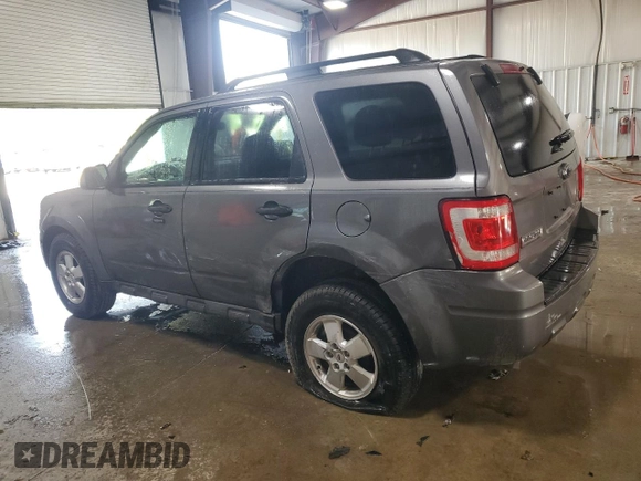 2012 Ford Escape XLT z VIN 1FMCU9DG8CKA93402, wystawiony jako Copart lot #62266845 z przebiegiem 196 779 mil mil oraz Szkoda całkowita • Salvage title. Historia ofert i sprzedaży dostępna na DreamBid. Obrazek 2.