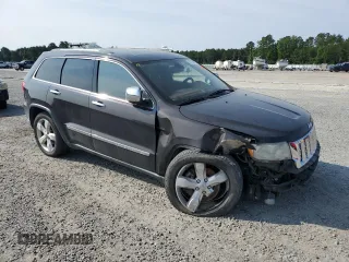 2011 Jeep Grand Cherokee Overland Summit with VIN 1J4RR6GT3BC686143, listed as a Copart auction lot 59218685 with 155,059 mi miles and Salvage title. Bid and sale history available at DreamBid. Image 4.