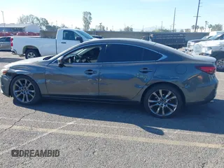 2017 Mazda 6 Grand Touring with VIN JM1GL1W51H1137470, listed as a IAAI auction lot 41872756 with 132,564 mi miles. Bid and sale history available at carsss.com. Image 14.