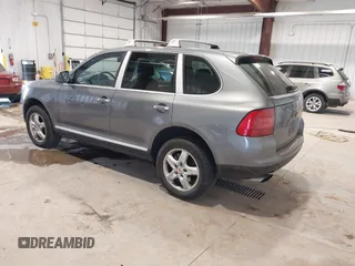 2004 Porsche Cayenne S with VIN WP1AB29P54LA69098, listed as a IAAI auction lot 41619941 with 236,820 mi miles. Bid and sale history available at carsss.com. Image 3.