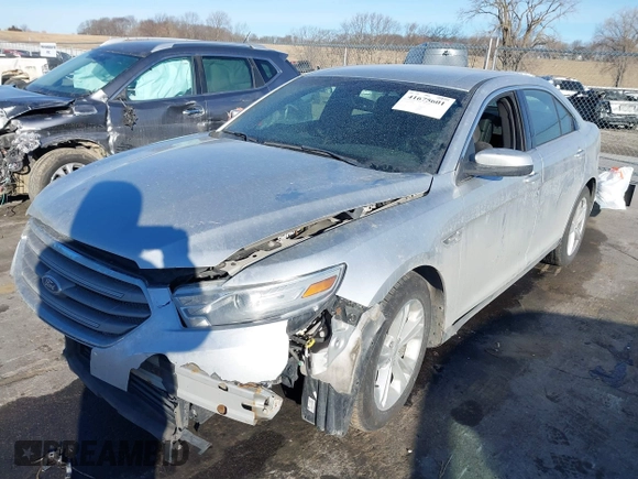 2013 Ford Taurus SEL with VIN 1FAHP2E83DG224780, listed as a IAAI auction lot 41675601 with 166,977 mi miles. Bid and sale history available at carsss.com. Image 2.