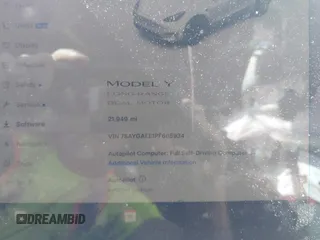 2023 Tesla Model Y Long Range with VIN 7SAYGAEE1PF665934, listed as a IAAI auction lot 41780949 with 21,949 mi miles and . Bid and sale history available at DreamBid. Image 7.