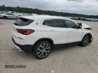 2022 BMW X2 sDrive28i with VIN WBXYH9C0XN5T46405, listed as a Copart auction lot 70291554 with 28,035 mi miles and Salvage Title. Bid and sale history available at carsss.com. Image 3.
