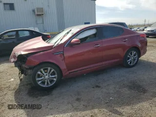 2013 Kia Optima EX z VIN 5XXGN4A79DG170476, wystawiony jako Copart lot #59086065 z przebiegiem 153 323 mil mil oraz Czysty tytuł • Clean title. Historia ofert i sprzedaży dostępna na DreamBid. Obrazek 1.