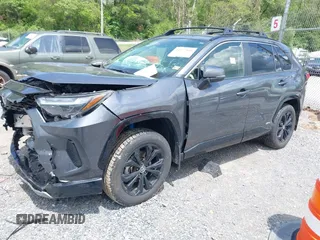 2023 Toyota RAV4 Hybrid SE with VIN JTM16RFV9PD113152, listed as a IAAI auction lot 42177056 with 41,204 mi miles and . Bid and sale history available at DreamBid. Image 2.