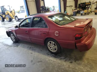 1997 Toyota Camry LE z VIN 4T1BG22K1VU033230, wystawiony jako Copart lot #52619265 z przebiegiem 301 543 mil mil oraz Szkoda całkowita • Salvage title. Historia ofert i sprzedaży dostępna na DreamBid. Obrazek 2.