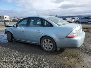 2009 Ford Taurus Limited with VIN 1FAHP25W09G118549, listed as a Copart auction lot 43234475 with 105,074 mi miles and Salvage Title. Bid and sale history available at carsss.com. Image 2.