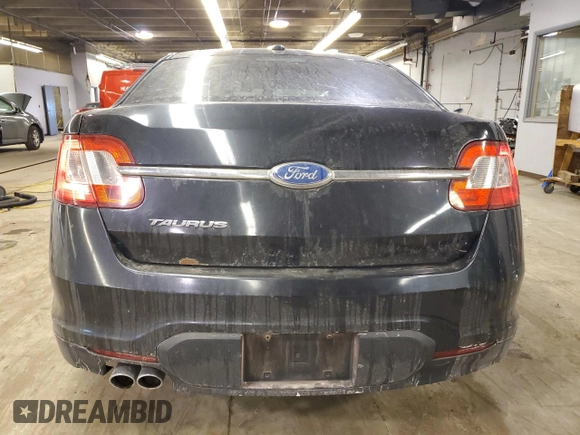 2011 Ford Taurus SE with VIN 1FAHP2DW3BG163699, listed as a Copart auction lot 43186495 with 84,493 mi miles and Salvage Title. Bid and sale history available at DreamBid. Image 6.