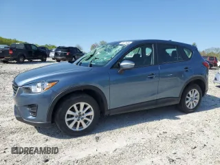 2016 Mazda CX-5 Sport с VIN JM3KE4BY8G0745522, выставлен на аукционе Copart как лот 56621825 с пробегом 98 757 миль миль и Списание • Salvage title. История ставок и продаж доступна на DreamBid. Изображение 1.