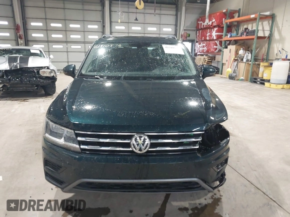 2018 Volkswagen Tiguan SEL with VIN 3VV2B7AX8JM113976, listed as a IAAI auction lot 42310576 with 100,319 mi miles and . Bid and sale history available at DreamBid. Image 12.