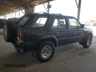 1995 Honda Passport z VIN 4S6CY58V4S4406803, wystawiony jako Copart lot #73057084 z przebiegiem 161 118 mil mil oraz Szkody całkowita. Historia ofert i sprzedaży dostępna na DreamBid. Obrazek 3.
