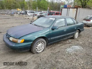 1995 Ford Taurus GL with VIN 1FALP52U8SA179395, listed as a Copart auction lot 53614265 with 71,082 mi miles and Salvage Title. Bid and sale history available at carsss.com. Image 1.
