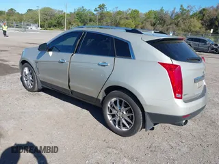 2013 Cadillac SRX Performance Collection with VIN 3GYFNDE39DS654591, listed as a IAAI auction lot 41855098 with 114,965 mi miles. Bid and sale history available at carsss.com. Image 3.