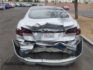 2017 Tesla Model S 60 with VIN 5YJSA1E17HF189627, listed as a IAAI auction lot 41891766 with 106,003 mi miles and . Bid and sale history available at DreamBid. Image 12.