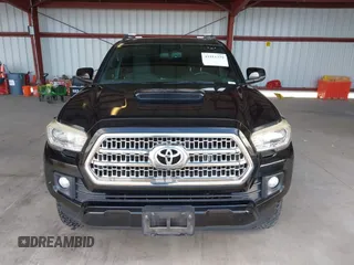 2016 Toyota Tacoma SR with VIN 5TFCZ5AN8GX020900, listed as a IAAI auction lot 41911329 with 133,931 mi miles. Bid and sale history available at carsss.com. Image 12.