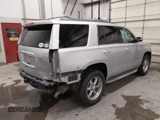 2015 Chevrolet Tahoe LT z VIN 1GNSKBKC7FR255956, wystawiony jako IAAI lot #42310560 z przebiegiem 215 968 mil mil oraz . Historia ofert i sprzedaży dostępna na DreamBid. Obrazek 4.