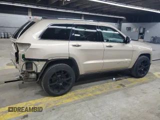 2014 Jeep Grand Cherokee Limited z VIN 1C4RJFBG1EC148908, wystawiony jako Copart lot #54311675 z przebiegiem 90 886 mil mil oraz Szkoda całkowita • Salvage title. Historia ofert i sprzedaży dostępna na DreamBid. Obrazek 3.
