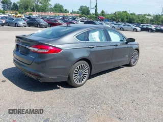 2018 Ford Fusion Titanium с VIN 3FA6P0SU2JR164525, выставлен на аукционе IAAI как лот 42585653 с пробегом 85 712 миль миль и . История ставок и продаж доступна на DreamBid. Изображение 4.