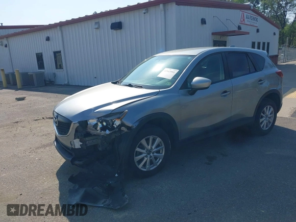 2014 Mazda CX-5 Touring with VIN JM3KE2CY9E0310315, listed as a IAAI auction lot 41943991 with 98,359 mi miles and . Bid and sale history available at carsss.com. Image 6.