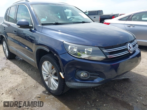 2012 Volkswagen Tiguan S with VIN WVGBV7AX3CW571039, listed as a IAAI auction lot 41928361 with 165,938 mi miles and . Bid and sale history available at DreamBid. Image 1.