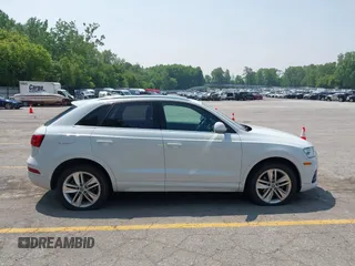 2016 Audi Q3 Premium Plus z VIN WA1EFCFSXGR014289, wystawiony jako IAAI lot #42440711 z przebiegiem 120 765 mil mil oraz . Historia ofert i sprzedaży dostępna na DreamBid. Obrazek 13.