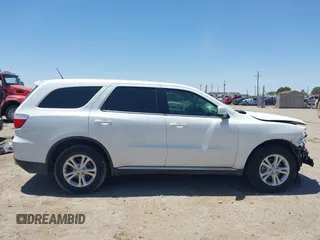2013 Dodge Durango SXT with VIN 1C4RDHAG0DC696904, listed as a IAAI auction lot 42310831 with 112,964 mi miles and . Bid and sale history available at DreamBid. Image 14.