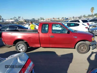 2001 Ford F-150 XL with VIN 1FTZX172X1NB47317, listed as a IAAI auction lot 41676446 with Not provided miles and . Bid and sale history available at DreamBid. Image 14.
