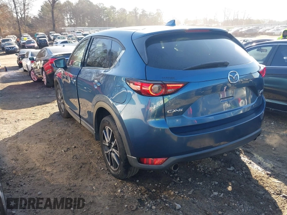 2018 Mazda CX-5 Grand Touring with VIN JM3KFADM9J1328501, listed as a IAAI auction lot 41408154 with 116,679 mi miles. Bid and sale history available at carsss.com. Image 3.
