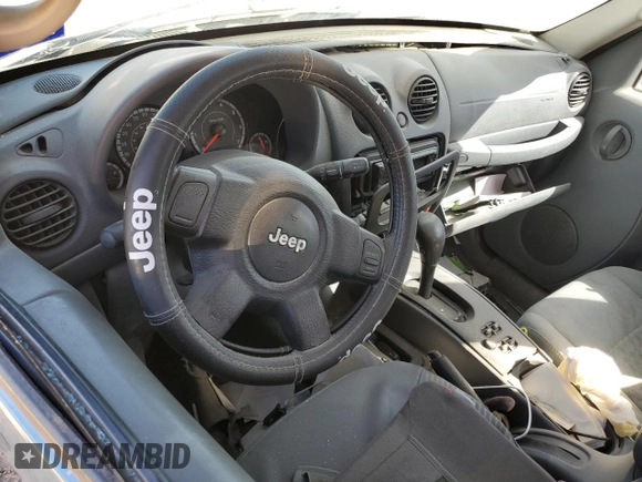 2005 Jeep Liberty Sport with VIN 1J4GK48K55W506055, listed as a Copart auction lot 76595204 with 0 mi miles and Salvage Title. Bid and sale history available at carsss.com. Image 8.