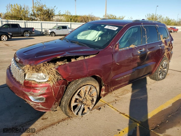 2017 Jeep Grand Cherokee Overland with VIN 1C4RJECG2HC868313, listed as a Copart auction lot 79510394 with 111,624 mi miles and Salvage Title. Bid and sale history available at carsss.com. Image 1.