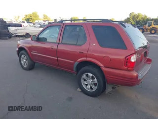 2001 Isuzu Rodeo S z VIN 4S2CK58W414308980, wystawiony jako IAAI lot #42496432 z przebiegiem 166 360 mil mil oraz . Historia ofert i sprzedaży dostępna na DreamBid. Obrazek 3.