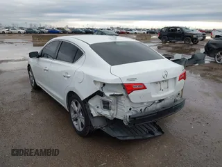 2014 Acura ILX Technology with VIN 19VDE1F77EE009606, listed as a IAAI auction lot 41753813 with 89,945 mi miles and . Bid and sale history available at DreamBid. Image 3.
