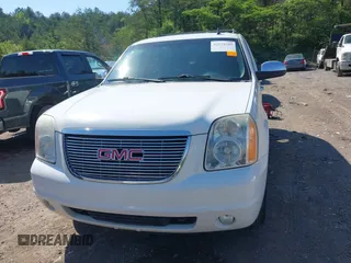 2009 GMC Yukon SLT w/4SA with VIN 1GKFK33049R241378, listed as a IAAI auction lot 42124385 with 292,192 mi miles. Bid and sale history available at carsss.com. Image 12.