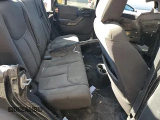 2018 Jeep Wrangler JK Unlimited Sport S with VIN 1C4BJWDG9JL884536, listed as a Copart auction lot 76707124 with 169,277 mi miles and Salvage Title. Bid and sale history available at carsss.com. Image 10.