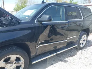 2018 Chevrolet Tahoe LT with VIN 1GNSKBKC7JR245565, listed as a IAAI auction lot 42097400 with 123,709 mi miles and . Bid and sale history available at DreamBid. Image 12.