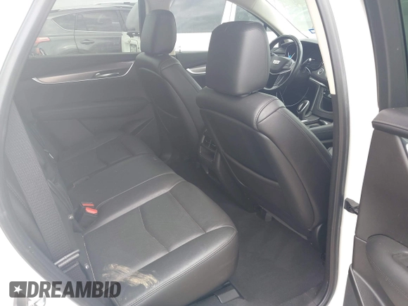 2019 Cadillac XT5 Luxury FWD z VIN 1GYKNCRSXKZ286643, wystawiony jako IAAI lot #42129213 z przebiegiem 87 091 mil mil oraz . Historia ofert i sprzedaży dostępna na DreamBid. Obrazek 8.