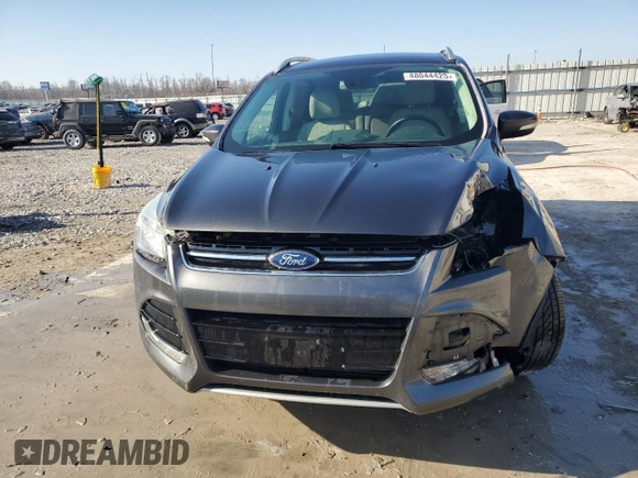 2016 Ford Escape Titanium with VIN 1FMCU9J91GUB34663, listed as a Copart auction lot 48044425 with 104,565 mi miles and Salvage Title. Bid and sale history available at carsss.com. Image 5.
