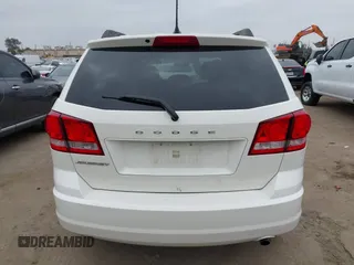 2014 Dodge Journey American Value with VIN 3C4PDCAB8ET141803, listed as a IAAI auction lot 42097292 with 76,339 mi miles and . Bid and sale history available at DreamBid. Image 16.