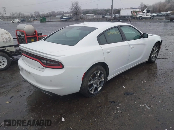 2015 Dodge Charger SXT with VIN 2C3CDXJG3FH746506, listed as a IAAI auction lot 41463713 with 130,687 mi miles. Bid and sale history available at carsss.com. Image 4.