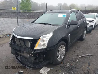 2014 Cadillac SRX Luxury Collection z VIN 3GYFNEE32ES643679, wystawiony jako IAAI lot #42172274 z przebiegiem 122 276 mil mil oraz . Historia ofert i sprzedaży dostępna na DreamBid. Obrazek 2.