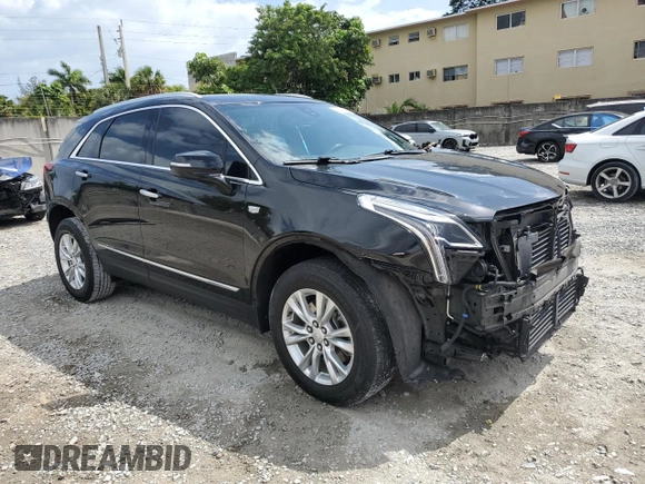2021 Cadillac XT5 FWD Luxury with VIN 1GYKNAR46MZ127028, listed as a Copart auction lot 47555235 with 48,364 mi miles and Salvage Title. Bid and sale history available at carsss.com. Image 4.