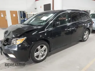 2011 Honda Odyssey Touring с VIN 5FNRL5H9XBB055008, выставлен на аукционе IAAI как лот 41973447 с пробегом 218 762 миль миль и . История ставок и продаж доступна на DreamBid. Изображение 2.