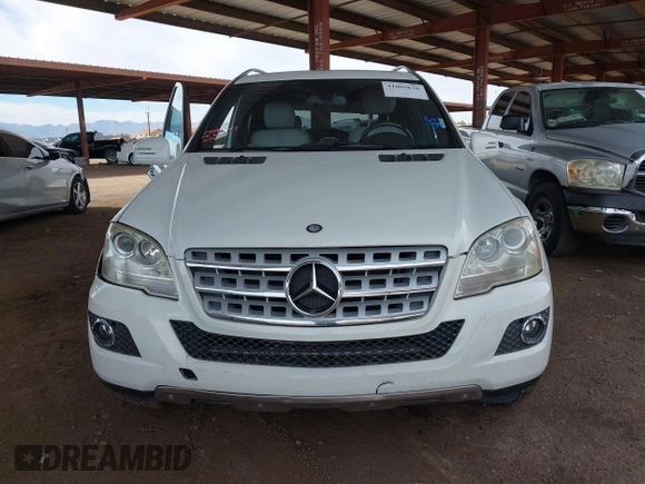 2011 Mercedes-Benz M 350 with VIN 4JGBB5GB8BA743294, listed as a IAAI auction lot 41809638 with 105,157 mi miles and . Bid and sale history available at DreamBid. Image 12.