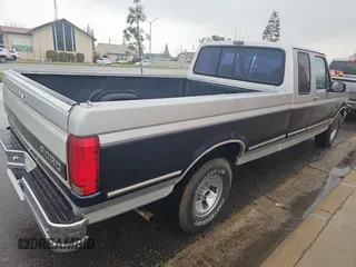 1992 Ford F-150 with VIN 1FTEX15H5NKA35781, listed as a Copart auction lot 48260665 with 162,014 mi miles and Clean Title. Bid and sale history available at carsss.com. Image 4.