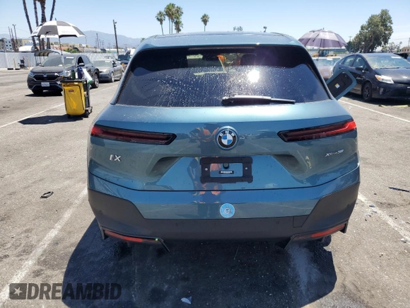 2022 BMW iX xDrive50 with VIN WB523CF07NCK56145, listed as a Copart auction lot 60202103 with 10,822 mi miles. Bid and sale history available at carsss.com. Image 6.