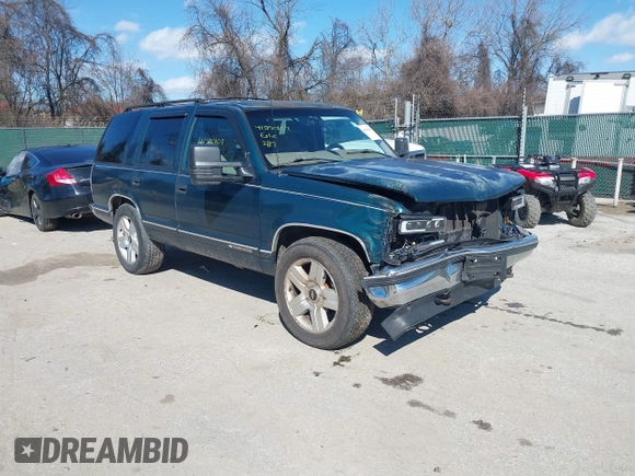 1999 Chevrolet Tahoe Z71 z VIN 1GNEK13R2XJ325602, wystawiony jako IAAI lot #41590107 z przebiegiem 204 611 mil mil oraz . Historia ofert i sprzedaży dostępna na DreamBid. Obrazek 1.