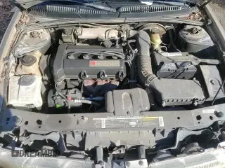 1998 Saturn SL с VIN 1G8ZK5275WZ210570, выставлен на аукционе Copart как лот 82993114 с пробегом 144 690 миль миль и Списание • Salvage title. История ставок и продаж доступна на DreamBid. Изображение 13.