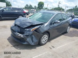 2021 Toyota Prius L Eco z VIN JTDKAMFU3M3152785, wystawiony jako IAAI lot #42501351 z przebiegiem 60 489 mil mil oraz . Historia ofert i sprzedaży dostępna na DreamBid. Obrazek 19.